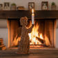 Thankgoods Rindenengel mit Kerze 29 cm vor Kamin
